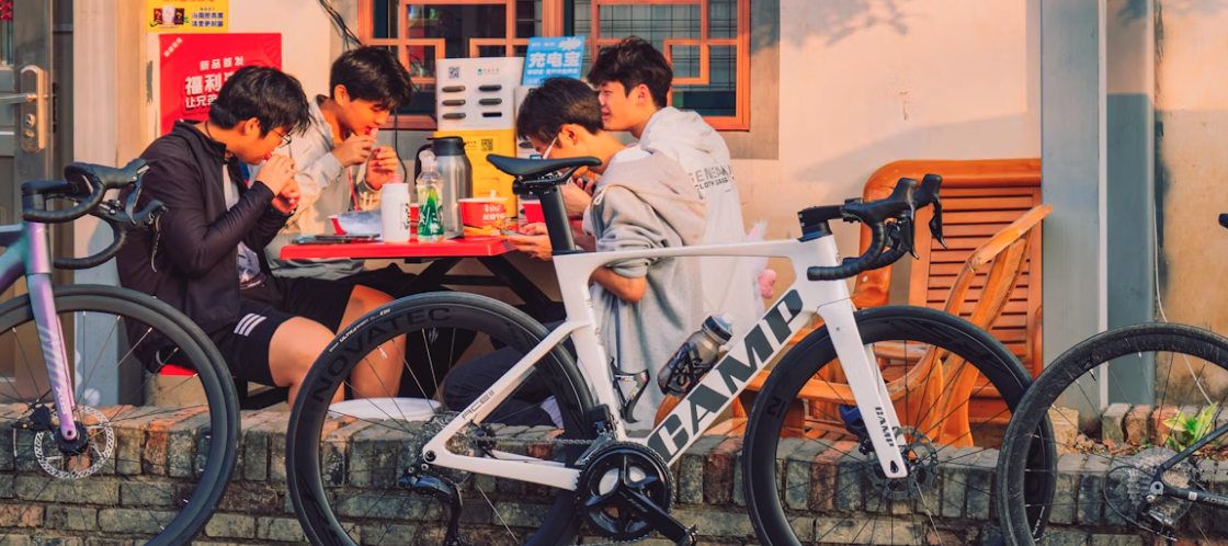 Finding the right time can make or break attendance Group of cyclists gathering for a community bike ride meetup, demonstrating well-timed event planning